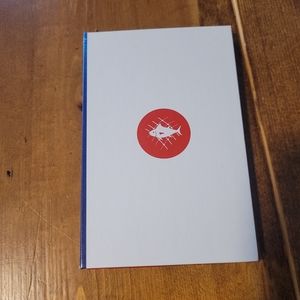 4 ocean overfishing red bracelet with placement holder.